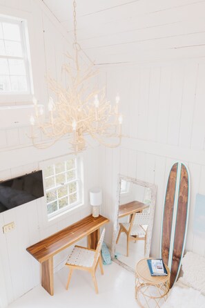 Airy, light bright guest cottage full of natural light, coastal chic decor.