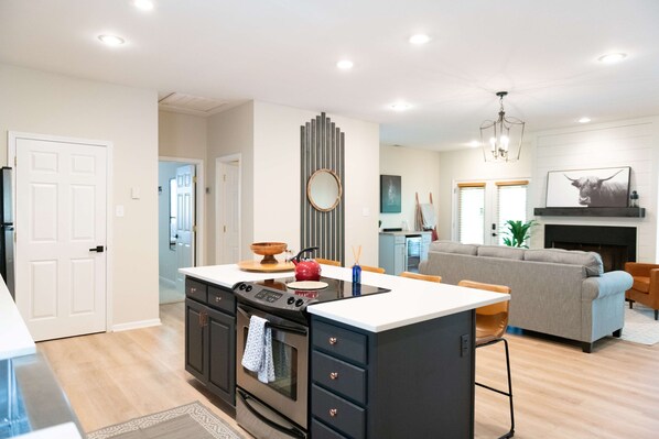 Open concept kitchen/living area on the main floor. All the family in one place