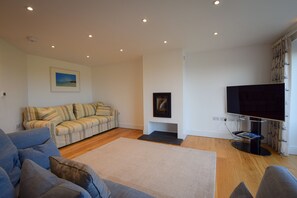 Sumptuous sofas in the open plan living area with HD SMART Tv 