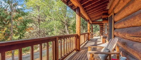 Welcome to Bear Ridge! Log Cabin with a large covered porch to soak in the views.