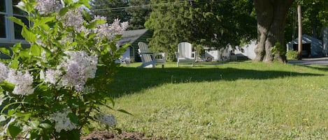 This corner lot is beautifully landscaped and designed to be a place to relax
