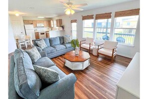 Living room with queen sleeper sofa.