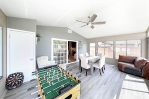 Foosball table and dart board