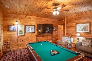 Game room is ready to watch Football or play pool...