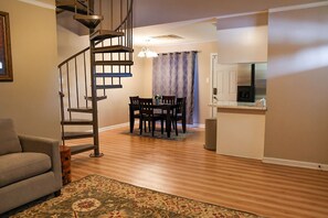 Dining room off kitchen with seating for four.