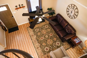 View of living room from upstairs loft.