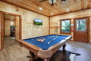 Pool table for endless hours of fun! 