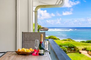 Dining space for four and seating for more, all with a beautiful ocean view