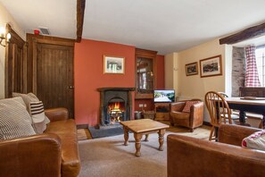 Pelton Wheel Cottage sitting room with log fire