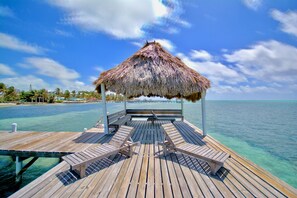 Pier with palapa & lounging; tour operators will pick you up/drop you off here