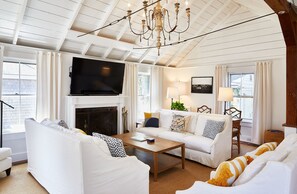 Main floor living area, seats 8+ people.