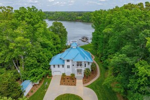 Aerial view of Blue Heaven from the front showing the lake 