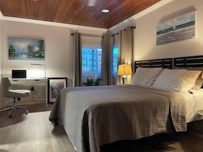 Bedroom has a new 14" queen size memory foam mattress, a quiet workplace, and a smart TV.