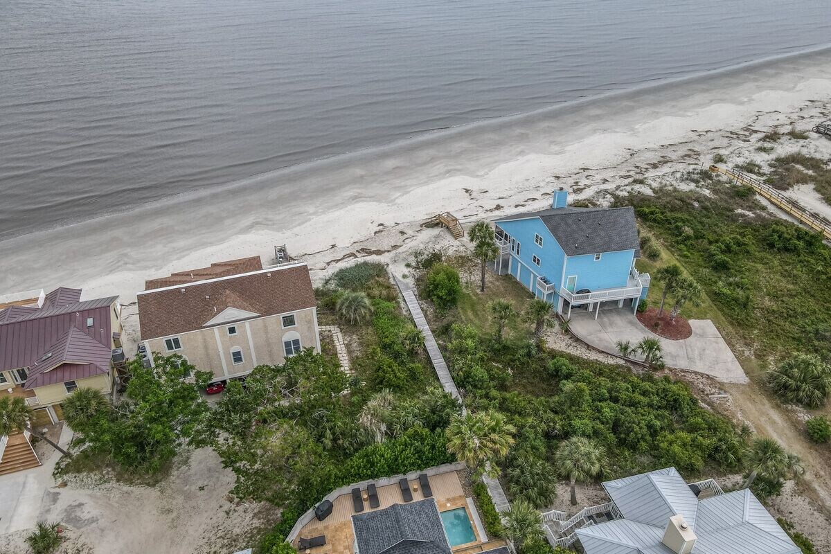 Lovely home with boardwalk beach access, water views, saltwater pool