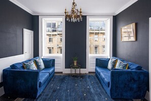 Living area with comfy sofas (that double up as a sofa bed).