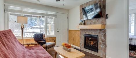 Your cozy living room complete with 42 inch Roku TV and gas fireplace