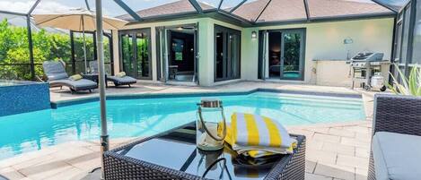 Relax & unwind with a private pool and lounge area. 