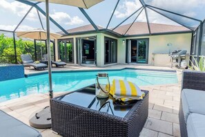 Relax & unwind with a private pool and lounge area. 