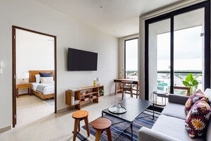 Living room with terrace. Bedroom.