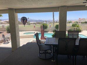 Back patio with amazing views. New outdoor carpet on the patio.