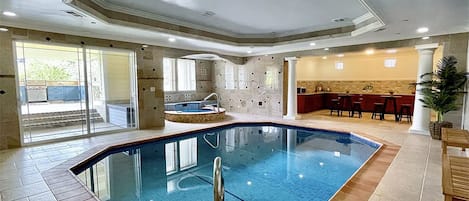 Downstairs indoor pool and NOIN jetted hot tub.