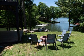 Fire Pit off the bottom deck with big water views! Perfect for the evening!
