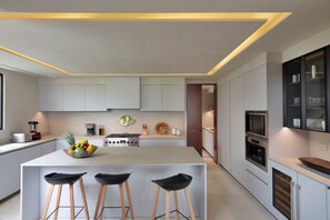 Fully equipped beach house kitchen with modern appliances