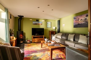 Living Room with logburner and 50" Smart TV
