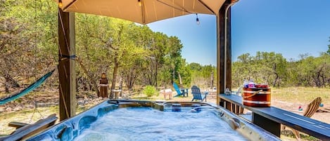 Downstairs hot tub that overlooks the nature preserve.