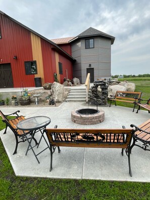 Enjoy the water feature as you’re seated around the fire pit. Weber grill to use