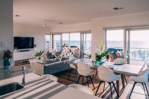 Upstairs open plan living, dining and kitchen area