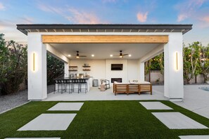 Cabana complete with grill, ice maker, bar area and cable TV