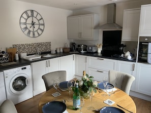 Open plan living/kitchen/dining area