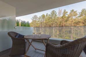 Private balcony with garden furniture, where you can pleasantly spend long summer evenings.