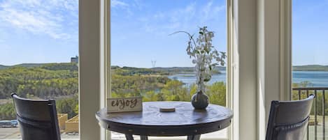 Sunroom with climate control, ample seating, lake view, and Smart TV