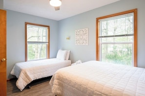 Bedroom with 1 queen and 1 twin bed.