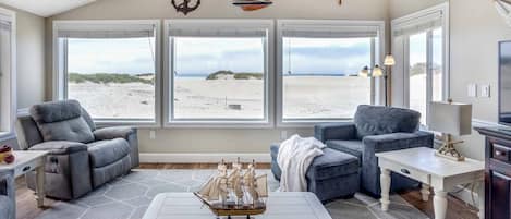 Relax and enjoy the ocean views from the living room.