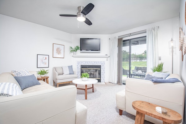 RELAX IN COZY LIVING ROOM AND ENJOY THE FIREPLACE.