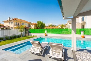 Private pool, terrace, and garden