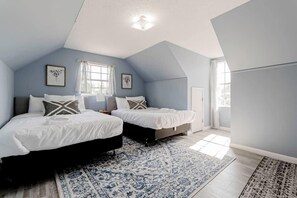 Calming Shade of Color in the bedroom with twin double bed