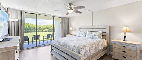 Serene master ensuite with King bed, TV, closet and walk out to oceanfront patio!