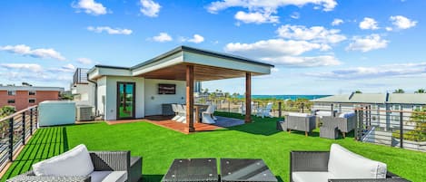 Huge rooftop deck with lots of seating!