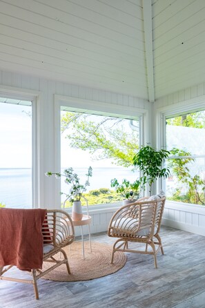 Infinite water views from the 3 season sunroom