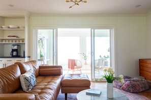 The sunroom is located off the Great Room, via double glass doors