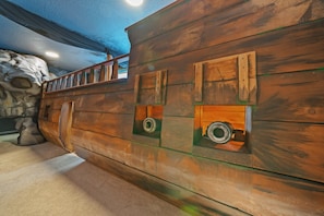 Pirate Ship themed bedroom with cannons