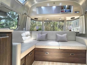 The spacious couch turns into a small double bed - big enough for two average-sized people to sleep in comfort. We also include a small collection of children and adult movies.