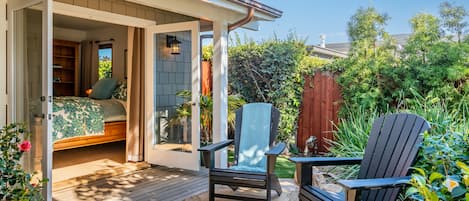 Bedroom #2 with double doors to front patio