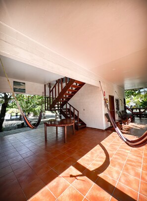 Living space with 3 hammocks