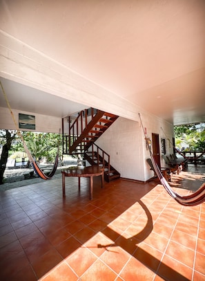 Living space with 3 hammocks