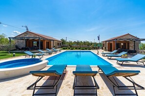 3.500sqm fenced property, 4 bedrooms, 4 bathrooms, 3 living rooms and 3 kitchens,  summer kitchen